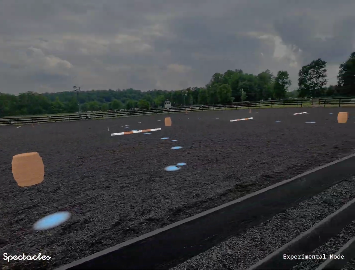 Virtual arena obstacles and path projected onto a real riding arena